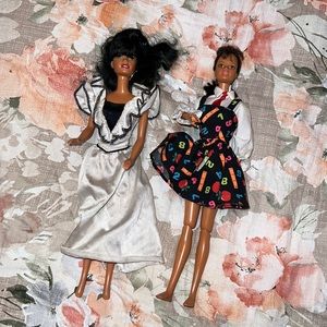 Two dark haired Barbies
